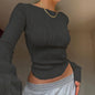 A clean, fitted crop with ruched texture and long sleeves.
